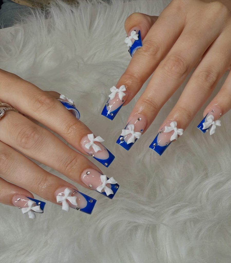 Blue Nail Tips with White Flowers
