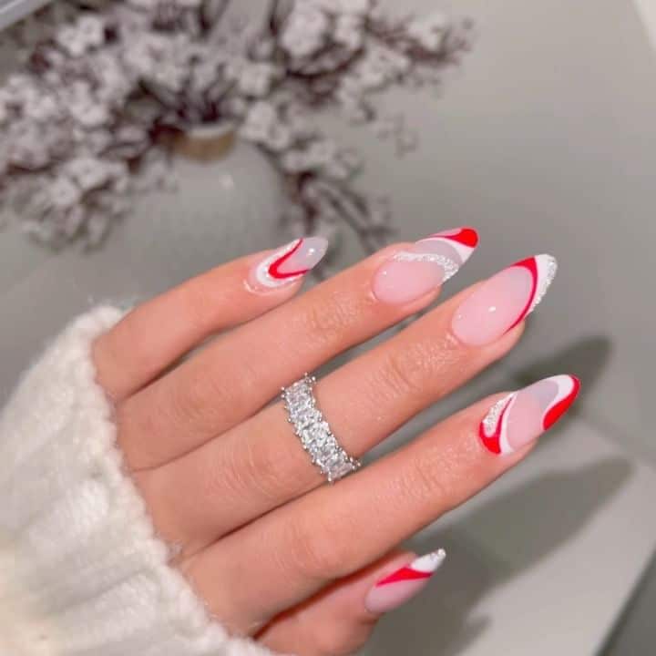 Swirly-White-Glitter-and-Red-Nails